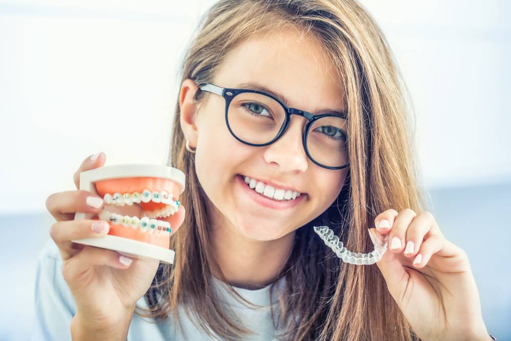 Invisalign vs. Braces ~ Which is faster and more effective?